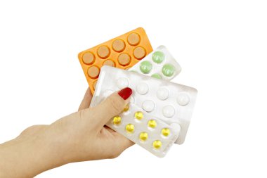 Different tablets for treatment in the hands of doctors  clipart