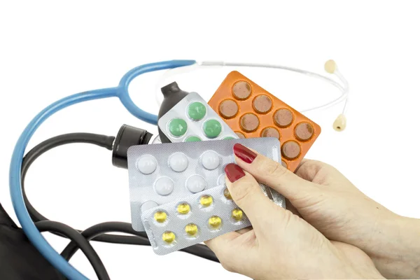 The pills in the hands of the doctor on the background of medica — Stock Photo, Image