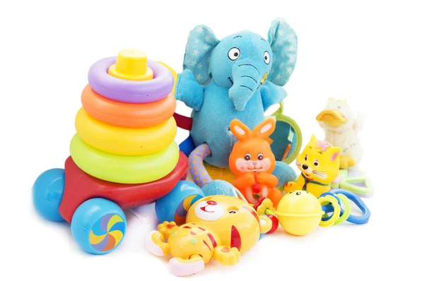 Küçük çocuklar için çeşitli renkli oyuncaklar — Stok fotoğraf