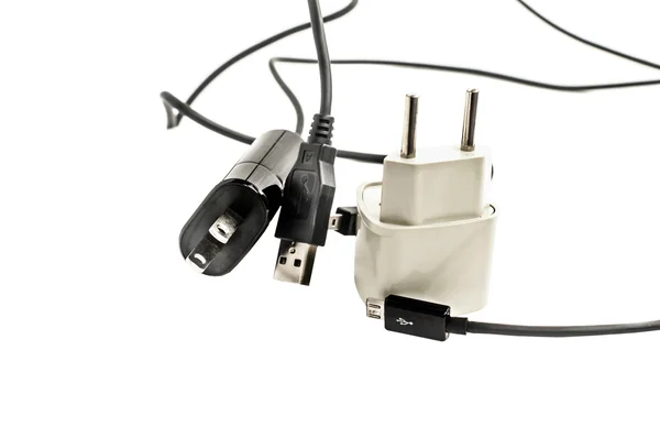 Olika kontakter med ledningar för strömförsörjning och adaptrar — Stockfoto