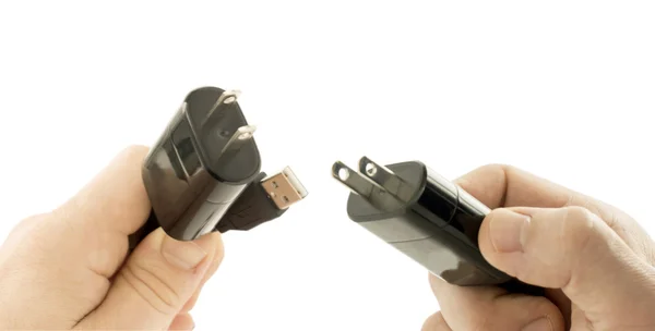 Stecker in der zwei Hand für elektrische Energie — Stockfoto