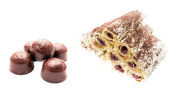 Chocolate with cherry filling and original cake with butter crea — Stock Photo, Image