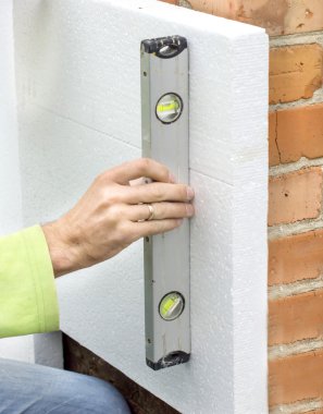 Onay düzlemsellik duvardaki bir düzey'ni kullanma