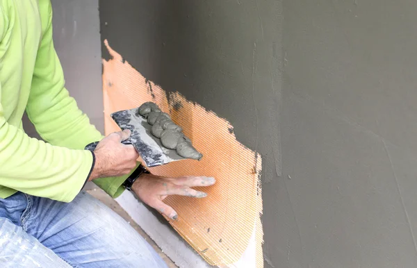 Plastered walls with a large spatula — Stock Photo, Image