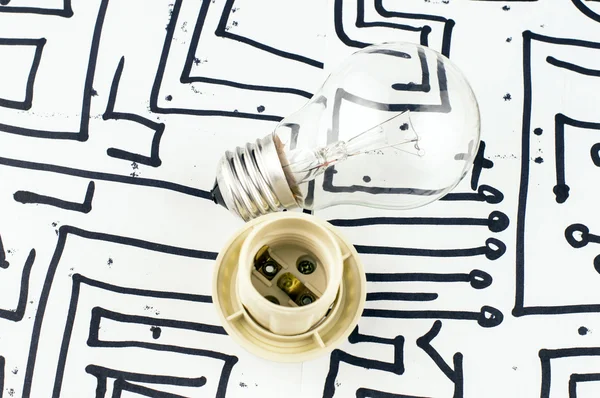Incandescent lamp and socket — Stock Photo, Image