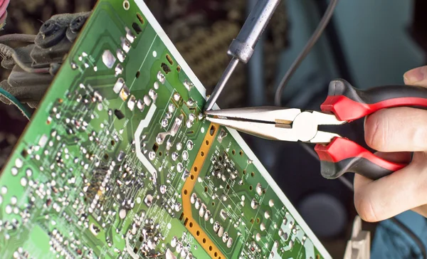 The process of soldering microcircuit tv — Stock Photo, Image