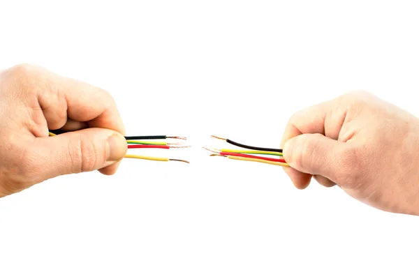 Different wires in his hand — Stock Photo, Image