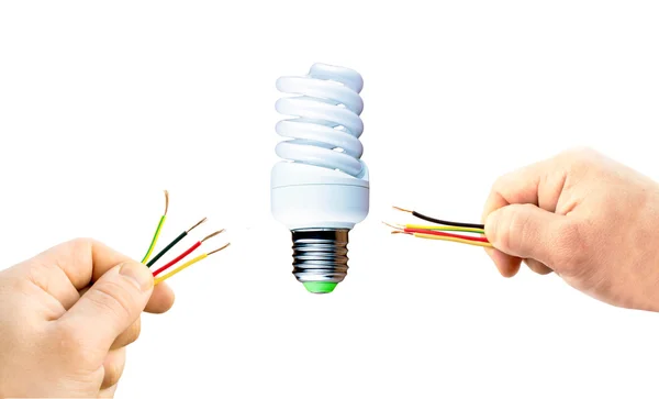 Various wires in his hand and fluorescent lamp — Stock Photo, Image