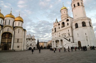 MOSCOW, RUSSIA - November 22, 2014: Inside Moscow Kremlin. Tourists visiting the Kremlin.Inside this Sobornaya Square where the Assumption Cathedral.