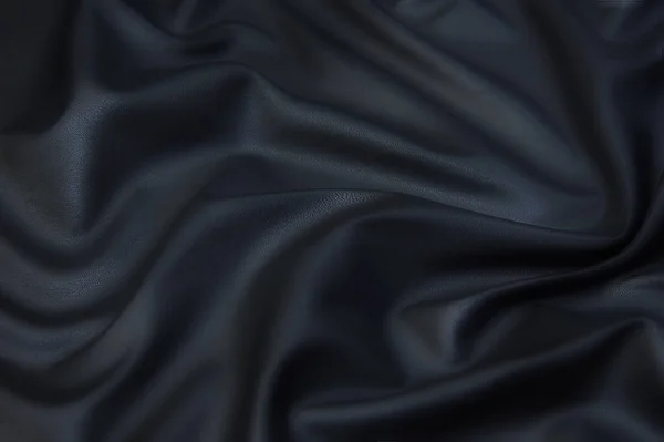 带波浪和褶皱的灰色人造皮革织物 — 图库照片