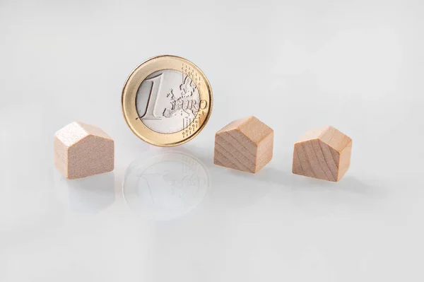 Miniature Wooden Houses Coins Using Property Financial Concept — Stock Photo, Image