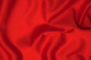 Doğal kırmızı ya da pembe kumaş ya da kumaşın yakın çekim dokusu aynı renkte. Doğal pamuk, ipek, yün veya keten kumaş dokusu. Kırmızı ve turuncu tuval arkaplan.