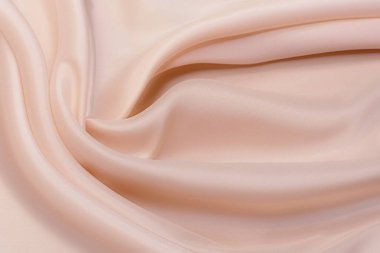 Açık pembe sentetik astarlı doku. Arkaplan, desen.