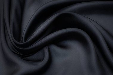 İpek kumaş. Koyu mavi renk. Doku, arkaplan, desen.