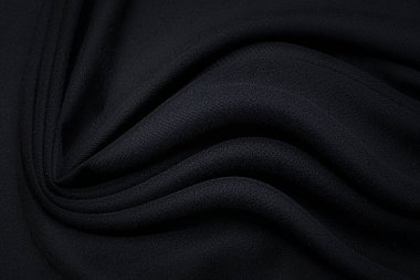 Sentetik kumaş. Siyah renk. Doku, arkaplan, desen.