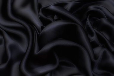 İpek kumaş. Koyu mavi renk. Doku, arkaplan, desen.