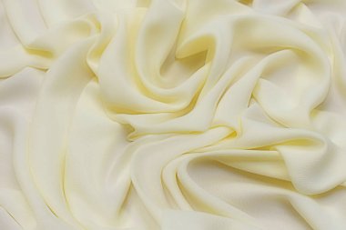 Sentetik kumaşın dokusu süt gibi. Arkaplan, desen.