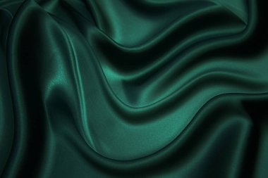 Doku, arka plan, desen. Yeşil ipek kumaş dokusu. Güzel zümrüt yeşil yumuşak ipek kumaş.