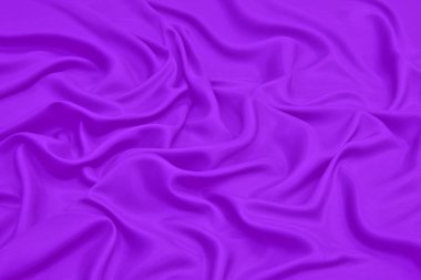 Güzel pürüzsüz dalgalı mor veya mor kumaş dokusu, tasarım için soyut arkaplan. 