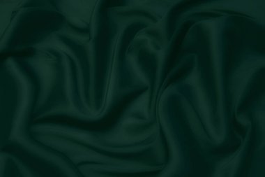 Doku, arka plan, desen. Yeşil ipek kumaş dokusu. Güzel zümrüt yeşil yumuşak ipek kumaş.