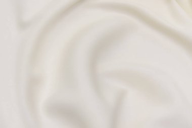 Doğal bej kumaşın yakın çekim dokusu ya da kahverengi renkli kumaş. Doğal pamuk veya keten kumaş dokusu. Bej tuval arkaplanı.