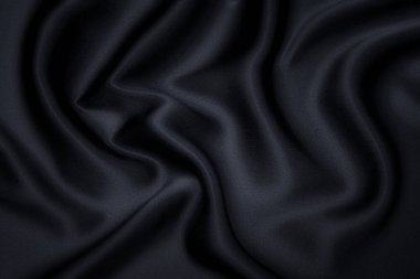 İpek, pamuk ya da yün kumaş dokusu. Koyu gri ya da siyah renk. Doku, arkaplan, desen.