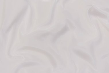 Doğal bej, fildişi, beyaz kumaş ya da kumaşın yakın çekim dokusu. Doğal pamuk, keten ya da ipek kumaş dokusu. Parlak renk tuval arkaplanı.