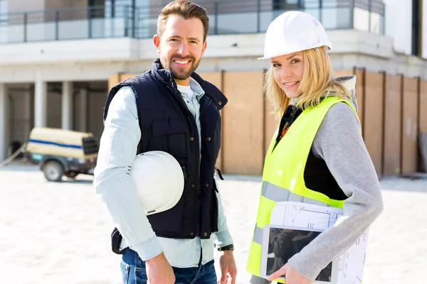 Portrait of a worker team at the end of the construction — Stock Photo, Image
