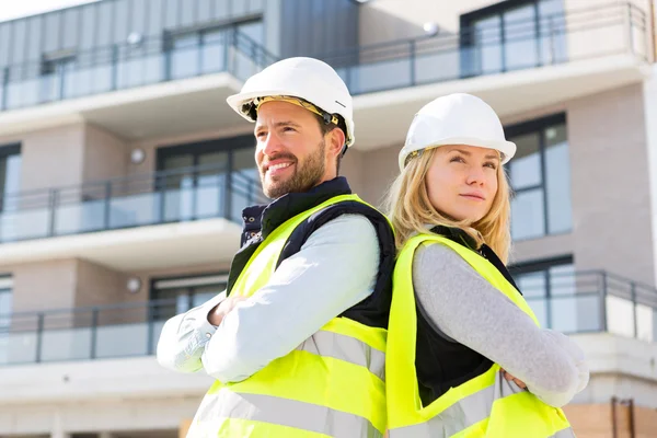 Portrait of a worker team at the end of the construction — Stock Photo, Image