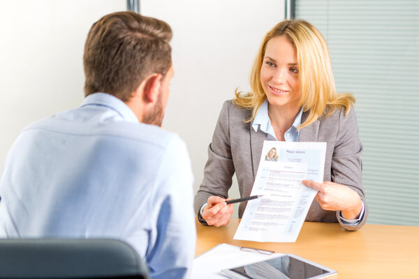 Young attractive woman during job interview