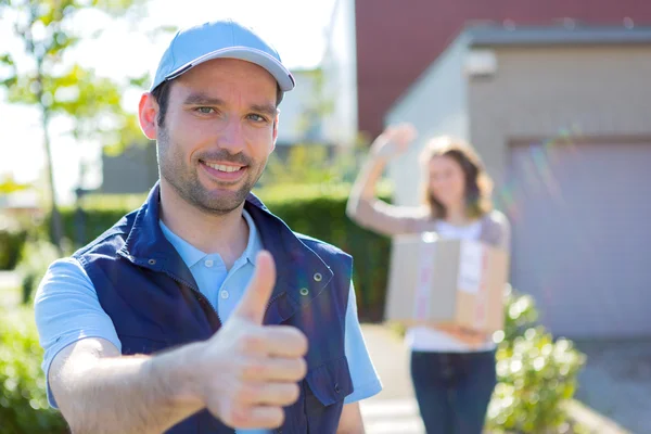 Delivery man succeed during his delivery — Stock Photo, Image