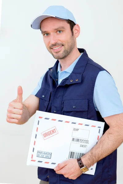 Delivery man on a white background — Stock Photo, Image