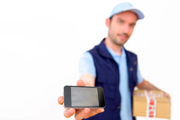 Delivery man on a white background — Stock Photo, Image