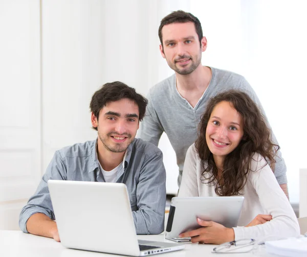 Group of young active people working together — Stock Photo, Image