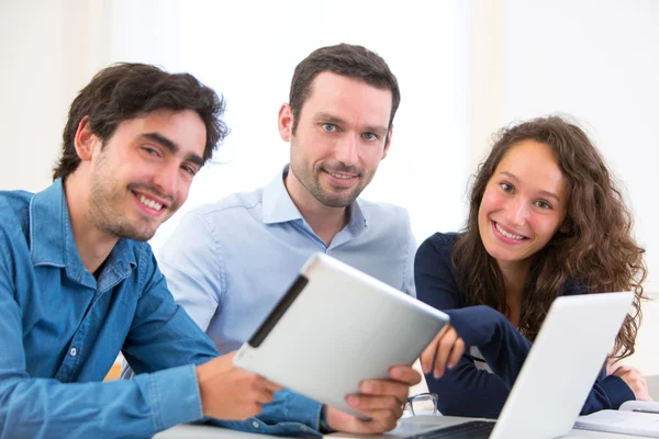 Group of young active people working together — Stock Photo, Image