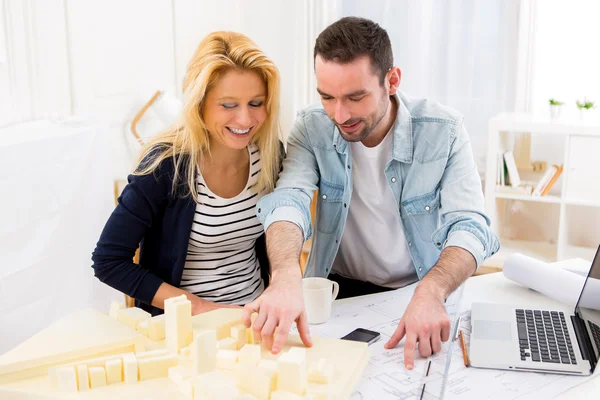 Two attractives architect working at the office — Stock Photo, Image