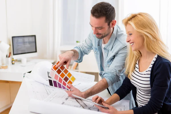 Two attractives architect working at the office — Stock Photo, Image