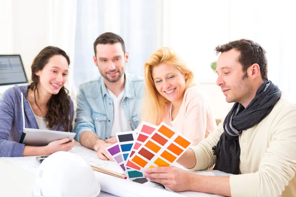Architect students choosing colors for their project Stock Photo