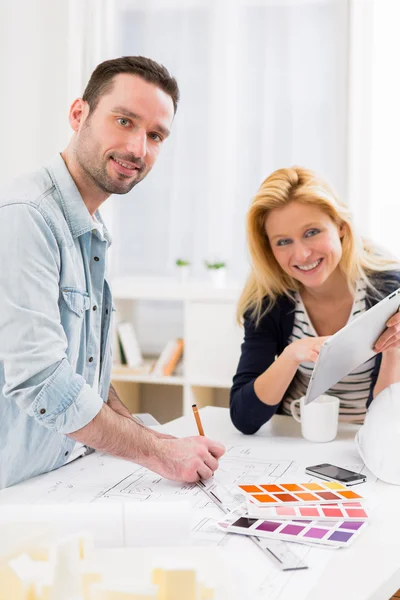 Two attractives architect working at the office — Stock Photo, Image
