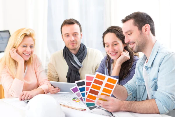 Architect students choosing colors for their project — Stock Photo, Image