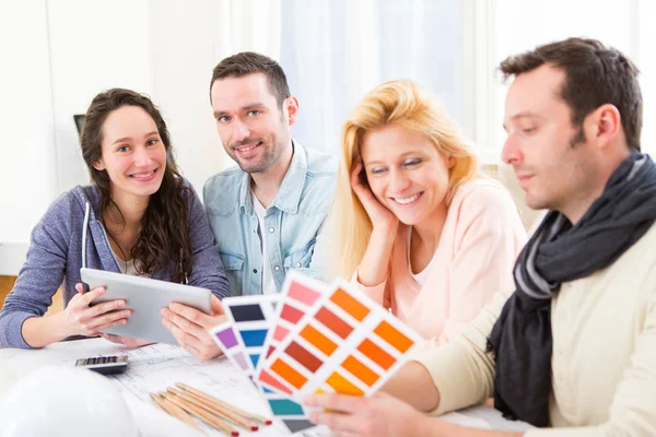 Architect students choosing colors for their project — Stock Photo, Image