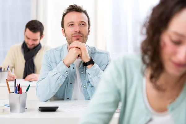 Young attractive man taking exams — Stock Photo, Image