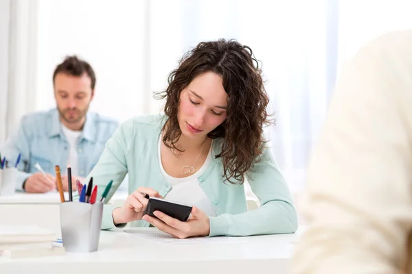 Young attractive student taking mathematics exams — Stock Photo, Image