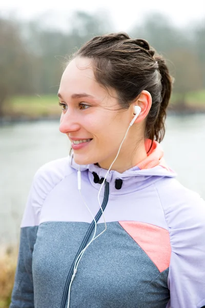 Portrait of a young attractive woman after a running session — Stock Photo, Image