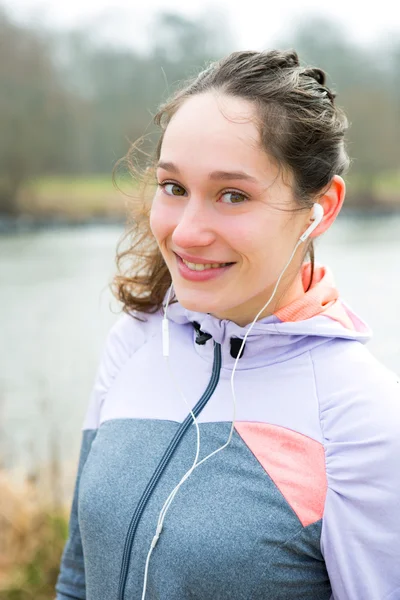 Portrait of a young attractive woman after a running session — Stock Photo, Image