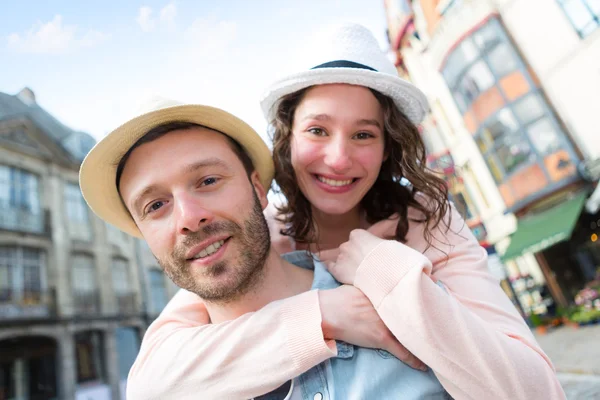 Young happy couple having fun on holidays — Stock Photo, Image
