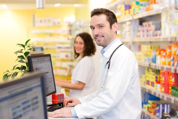 Portrait of an attractive pharmacist team at work — Stock Photo, Image