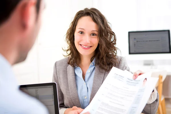Young attractive woman during job interview — Stock Photo, Image