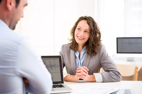 Young attractive woman during job interview — Stock Photo, Image