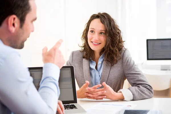 Young attractive woman during job interview — Stock Photo, Image